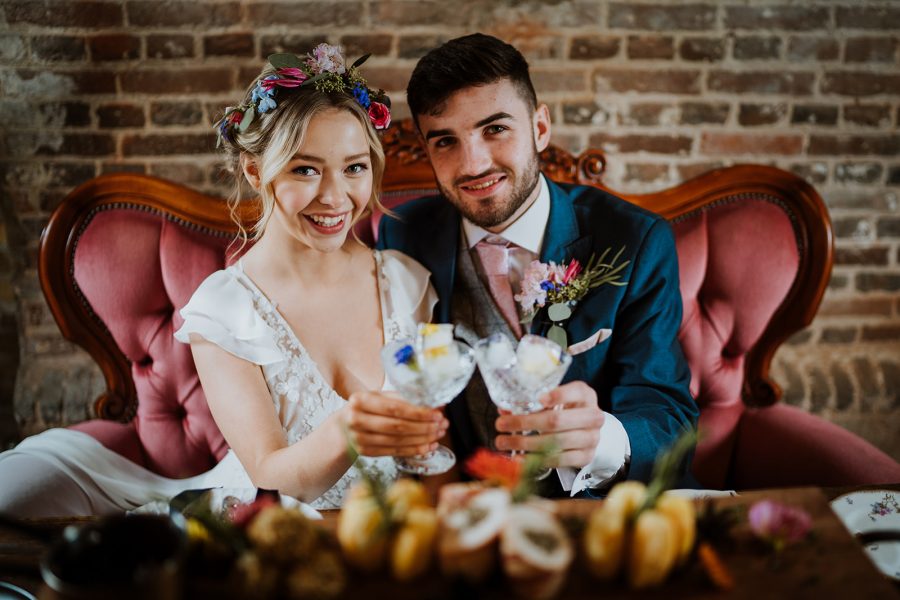 A happy couple toasting themselves