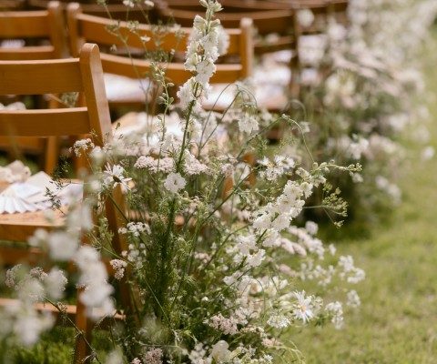 An outdoor wedding ceremony at Elmley Nature Reserve, a dry hire wedding venue in Kent